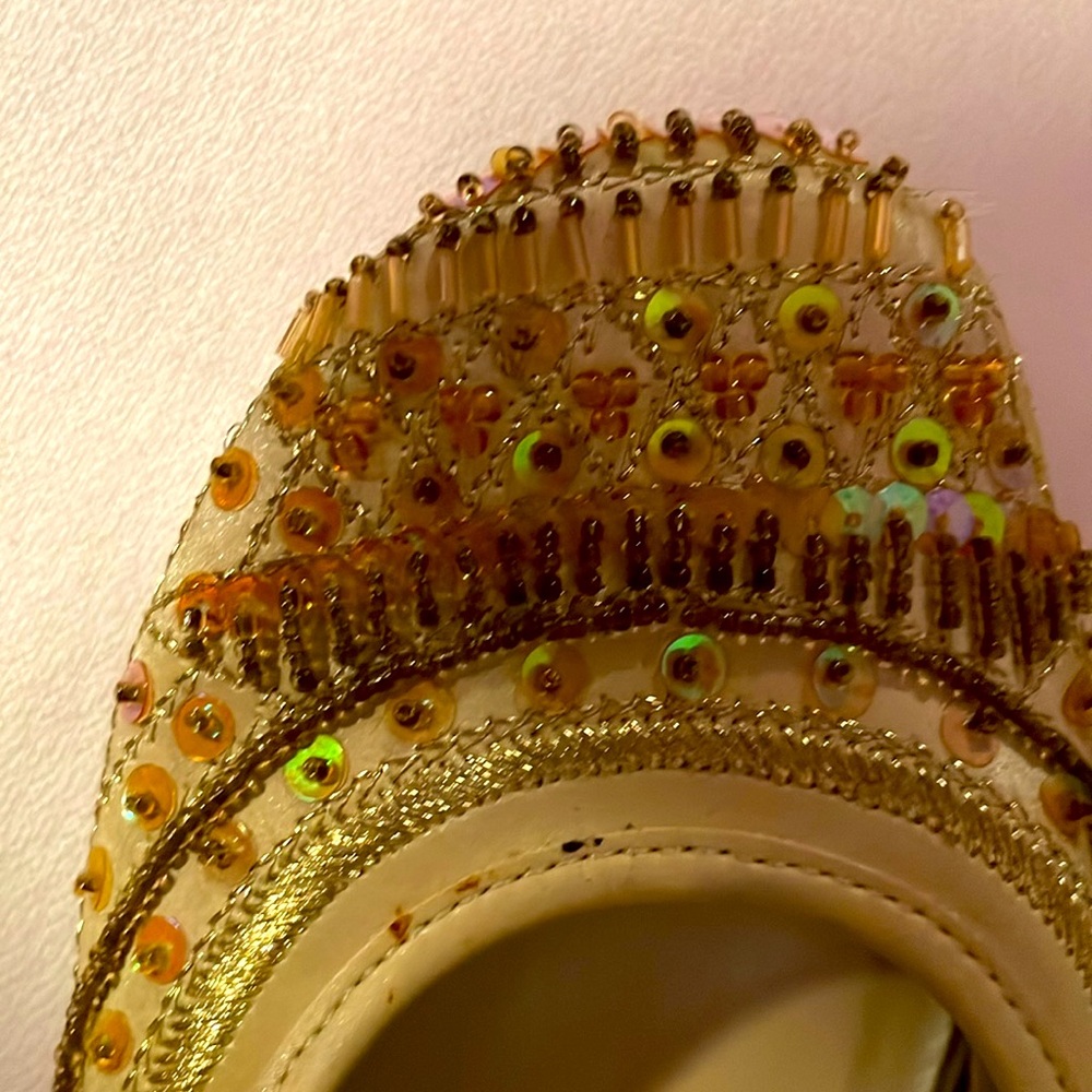 Girls slip on beaded shoes.       161.